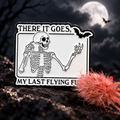 There It Goes, My Last Flying F*ck Skeleton Pin enamel pin on a themed background