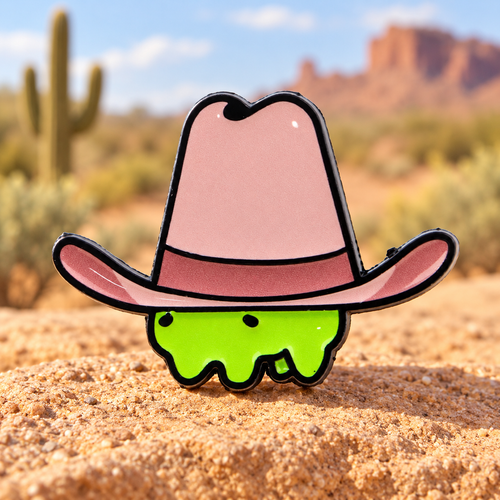 Tiny Frog under a Cowboy Hat Pin in a sunny desert scene