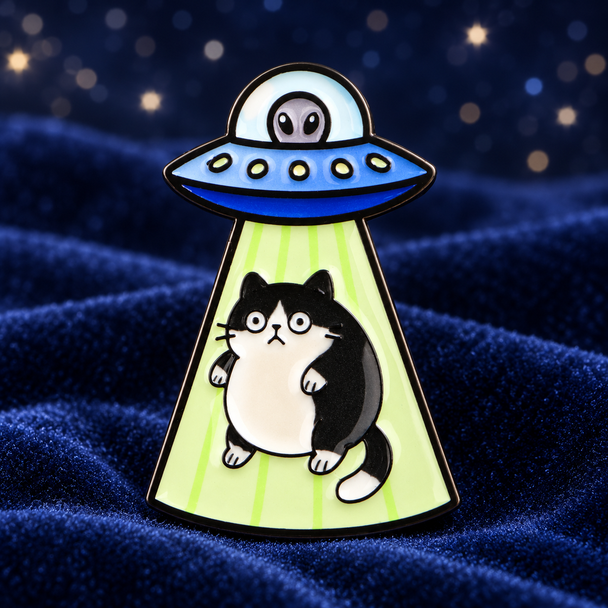 UFO Alien Fat Cat enamel pin on midnight-blue velvet