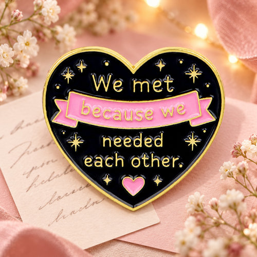 We Met Because We Needed Each Other Heart Pin on a warm pink floral background