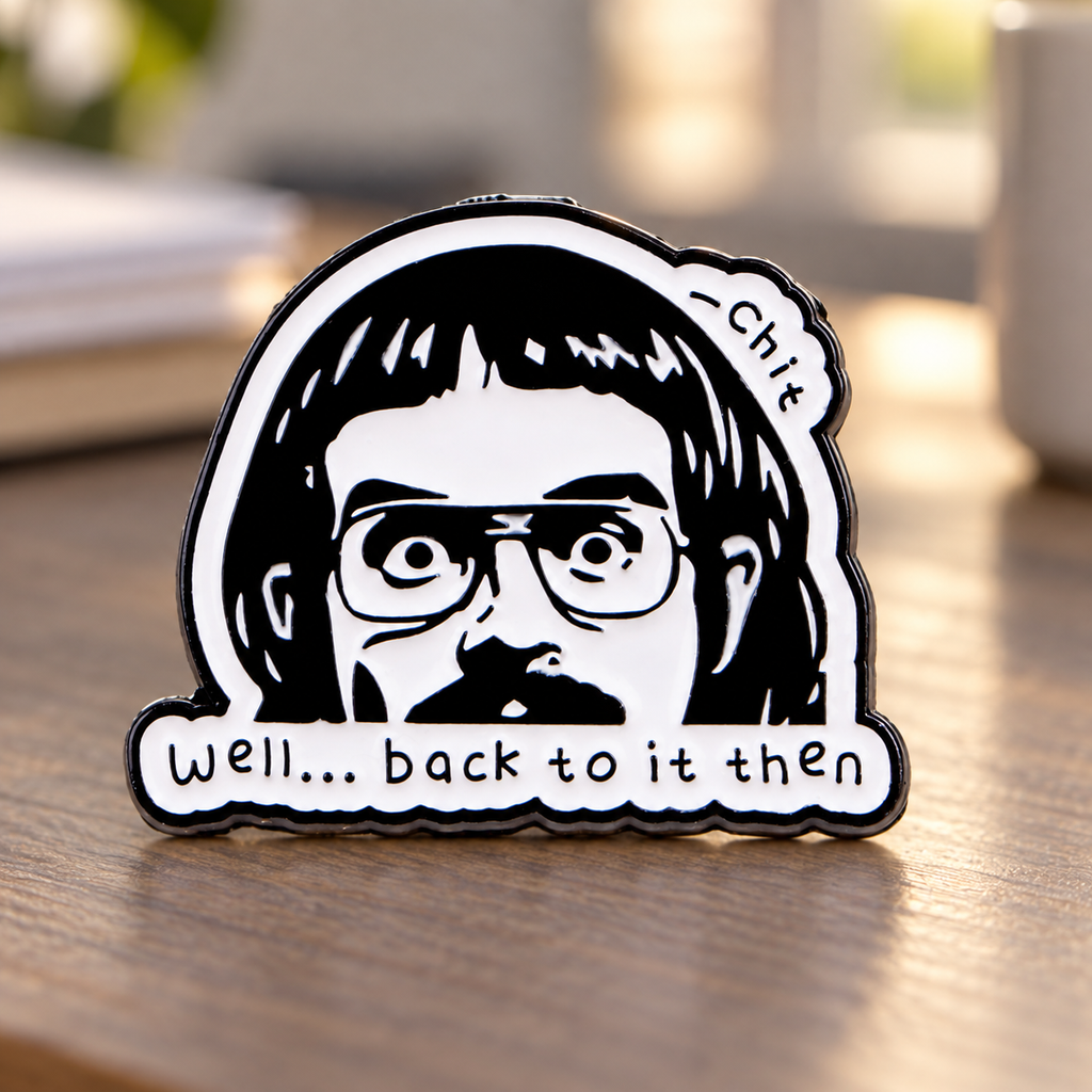 Well Back to It Then Portrait enamel pin on a warm office desk