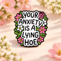 Your Anxiety Is a Lying Hoe floral enamel pin on a blush spring floral background