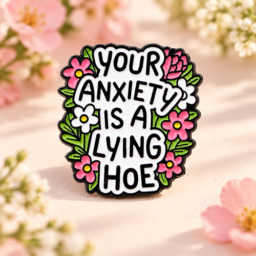 Your Anxiety Is a Lying Hoe floral enamel pin on a blush spring floral background